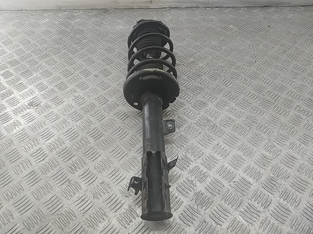 Амортизатор передний левый