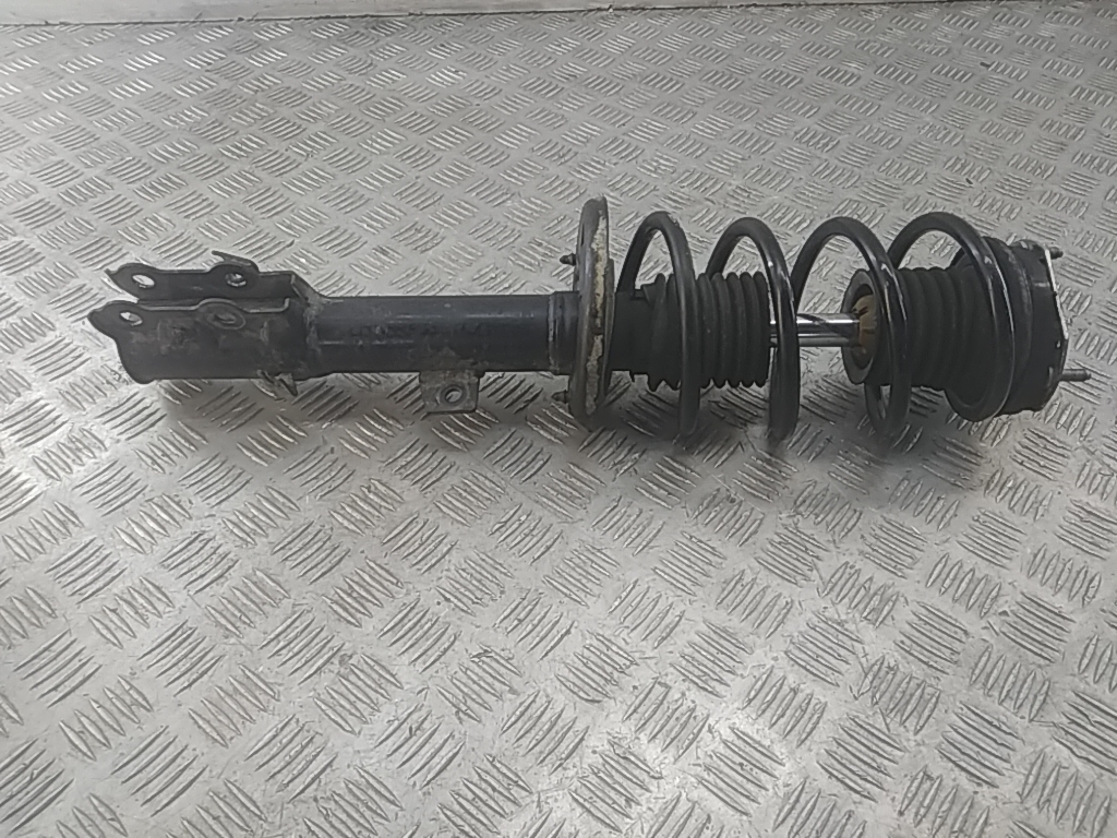 Амортизатор передний левый