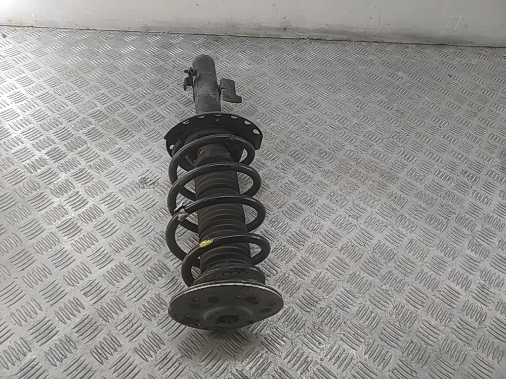 Амортизатор передний левый