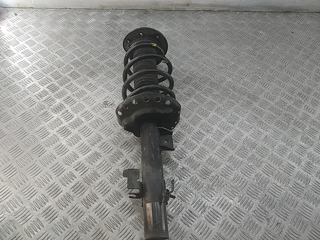 Амортизатор передний левый