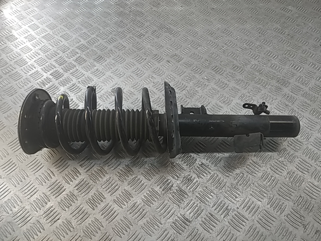 Амортизатор передний левый