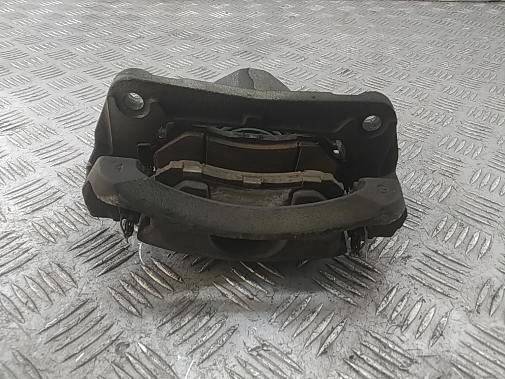 Суппорт передний левый