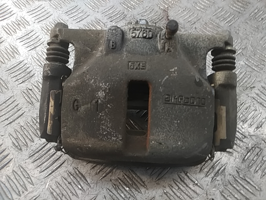 Суппорт передний левый