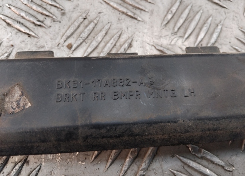 Кронштейн заднего бампера левый