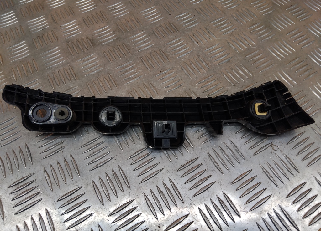 Кронштейн переднего бампера правый