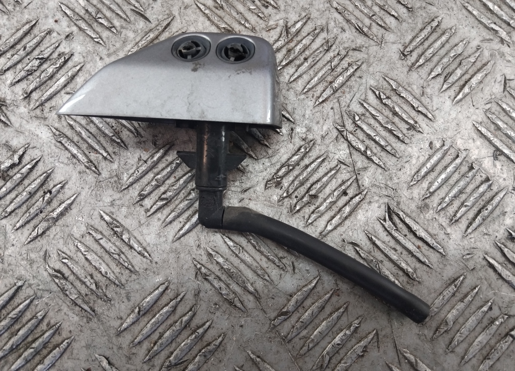 Форсунка омывателя фары