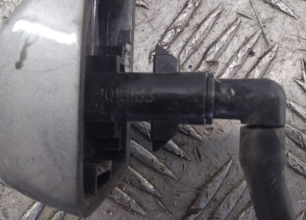 Форсунка омывателя фары