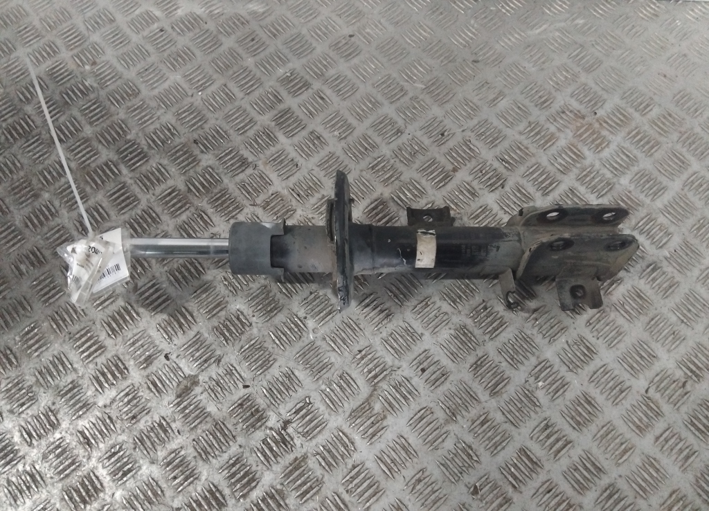 Амортизатор передний левый