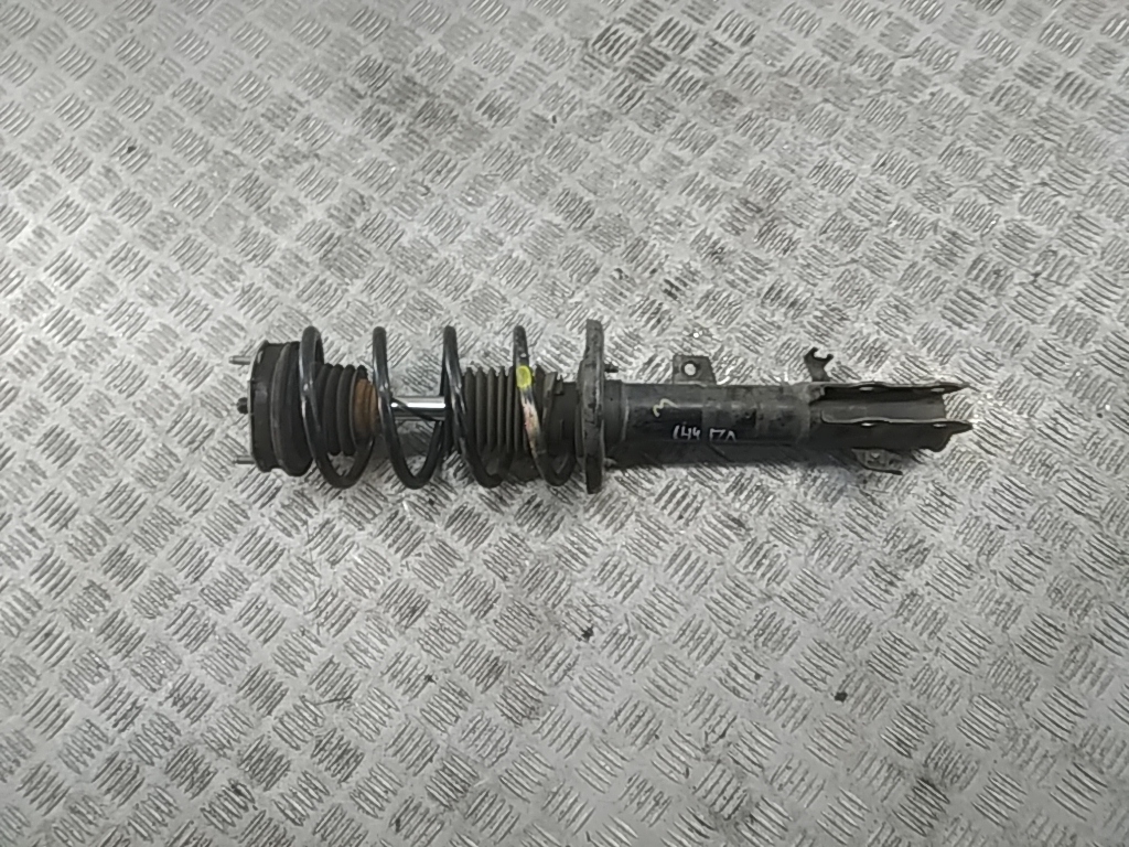 Амортизатор передний левый