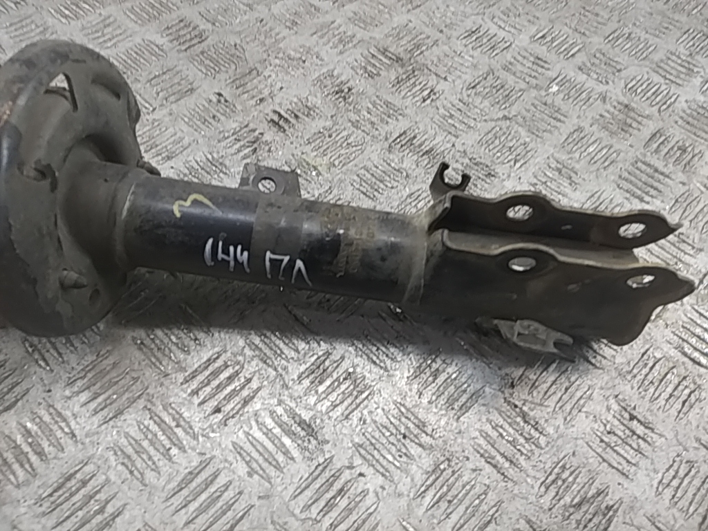 Амортизатор передний левый