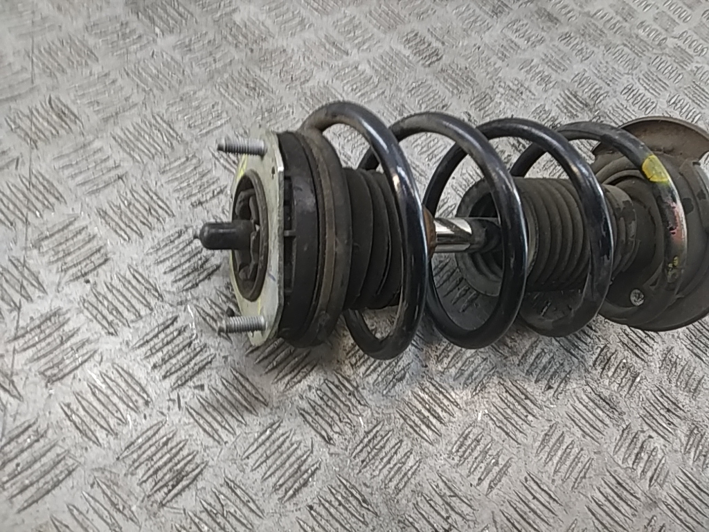 Амортизатор передний левый