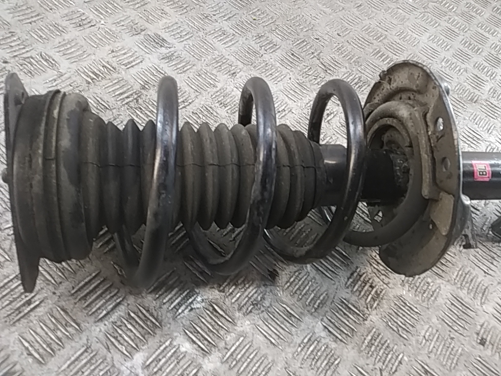 Пружина передняя
