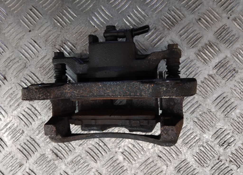 Суппорт передний левый