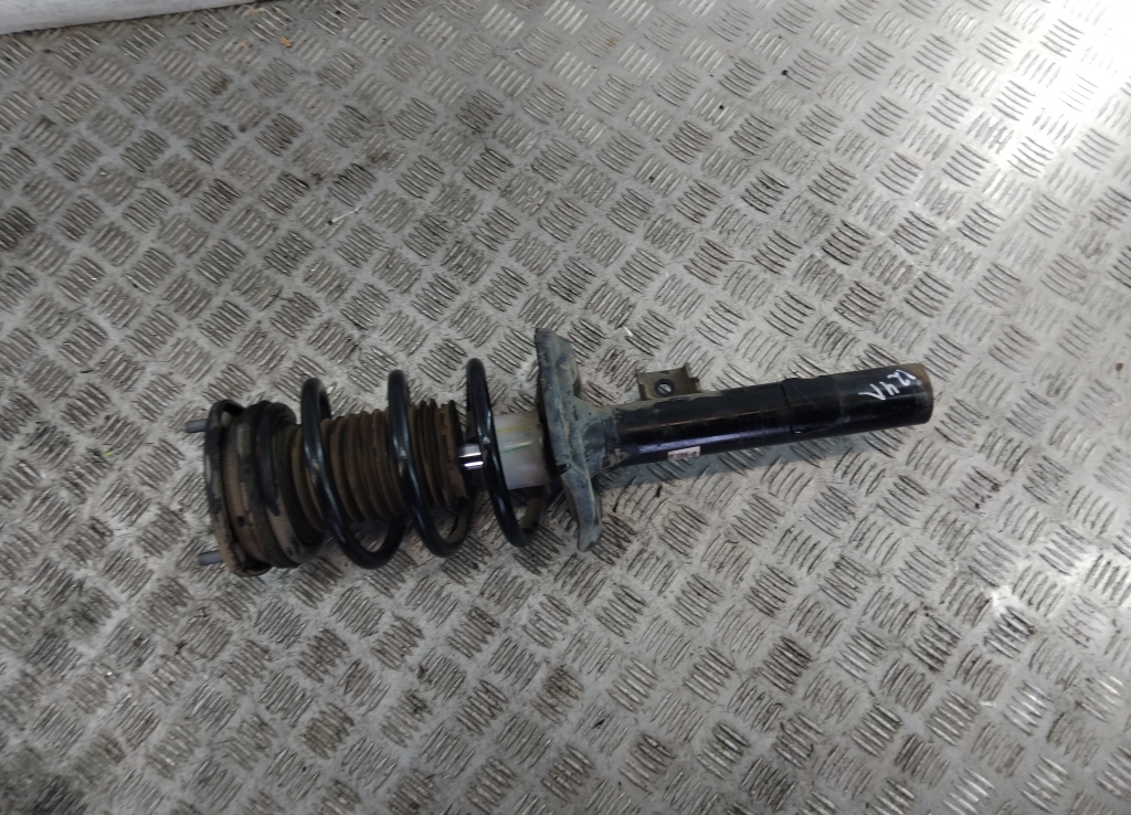 Амортизатор передний левый