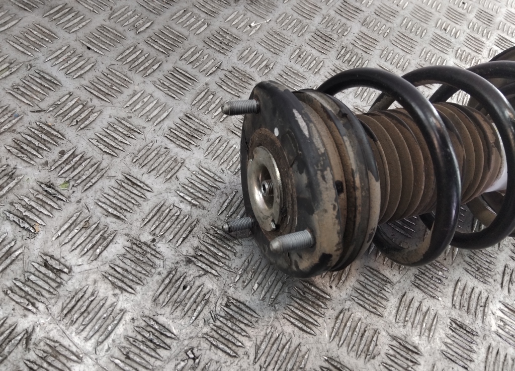 Амортизатор передний левый