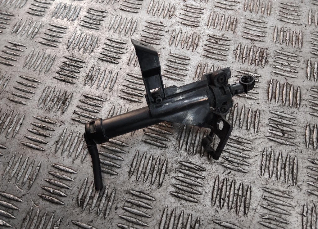 Форсунка омывателя фары