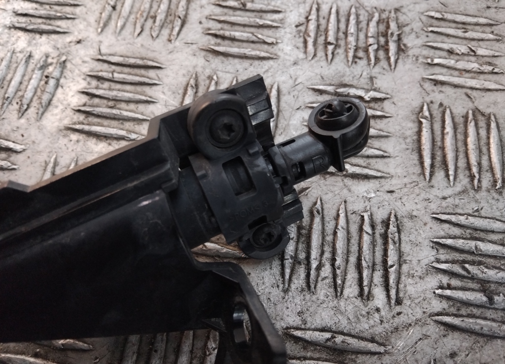 Форсунка омывателя фары