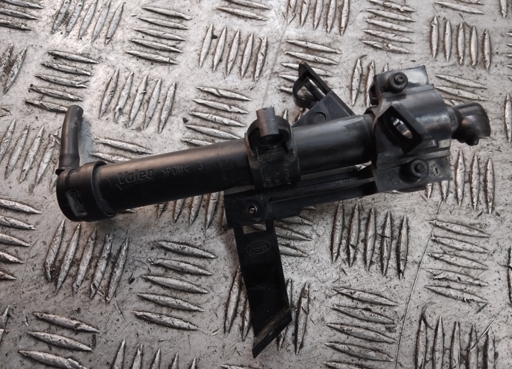 Форсунка омывателя фары