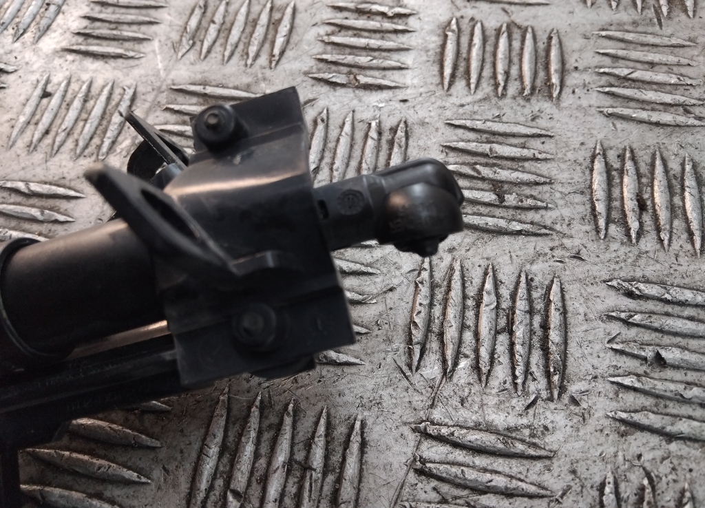 Форсунка омывателя фары