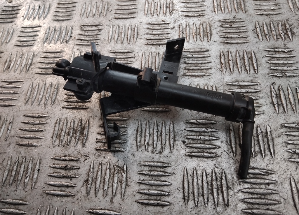 Форсунка омывателя фары