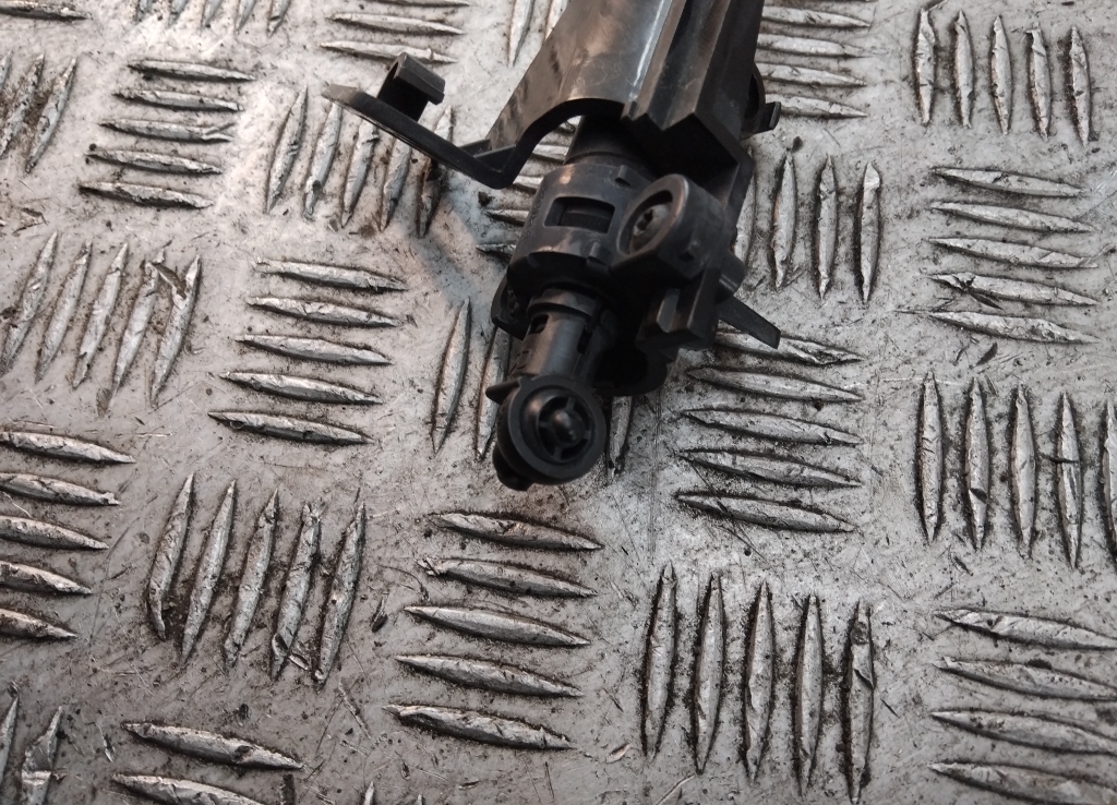 Форсунка омывателя фары