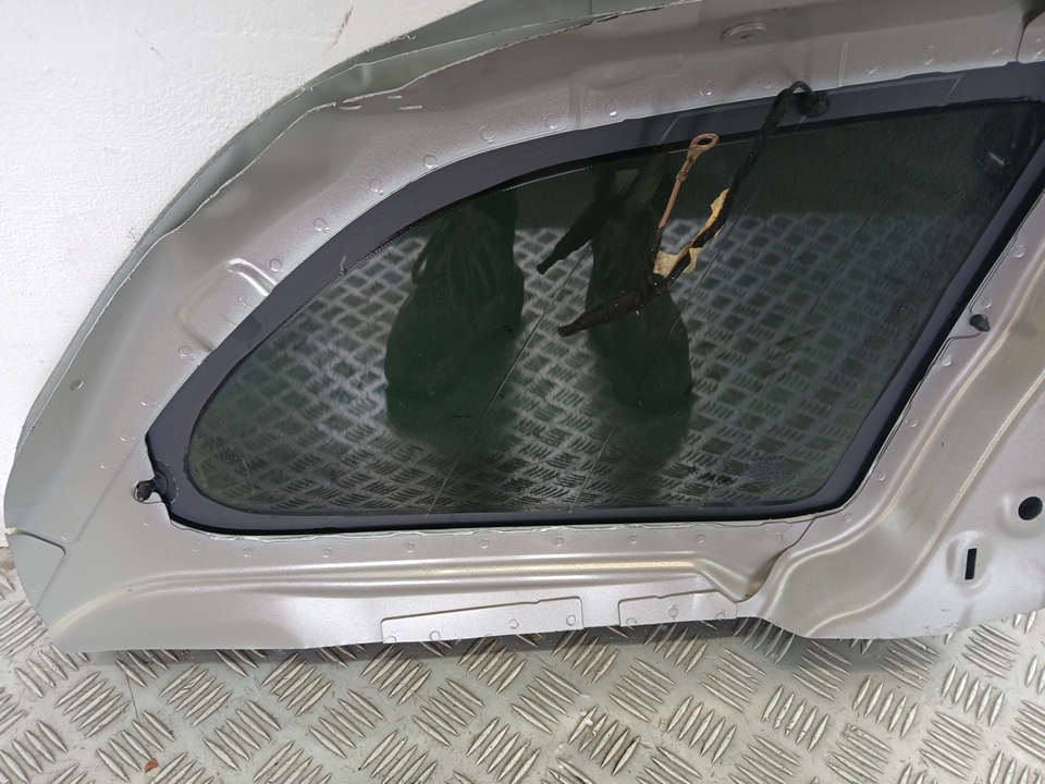 Стекло кузовное глухое левое