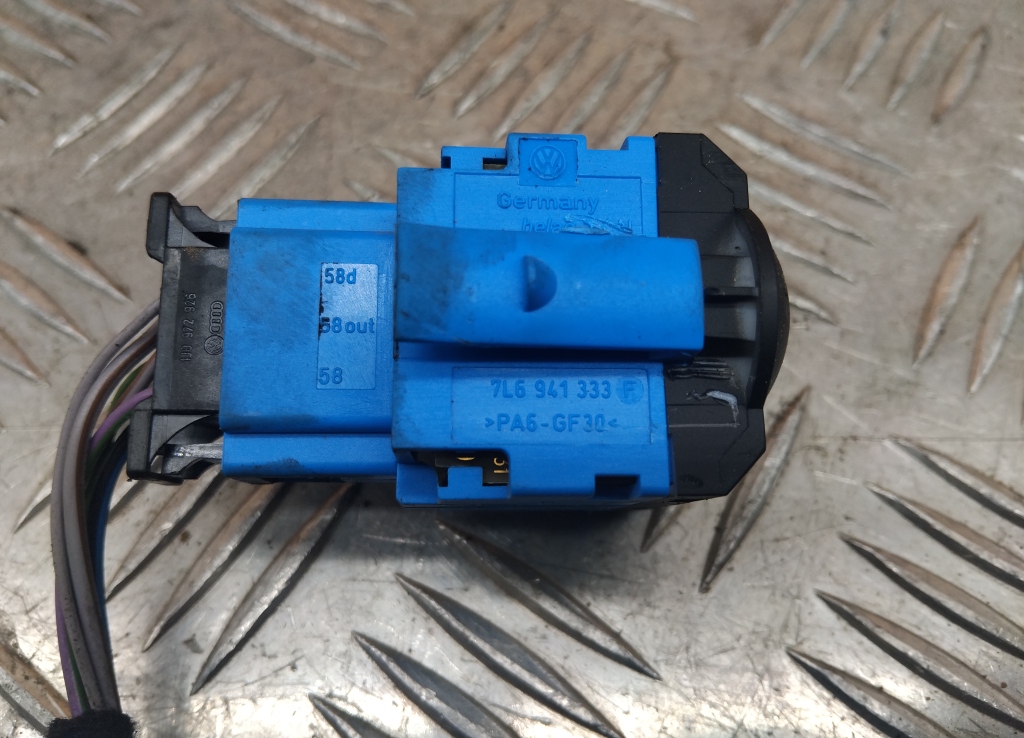 Кнопка корректора фар