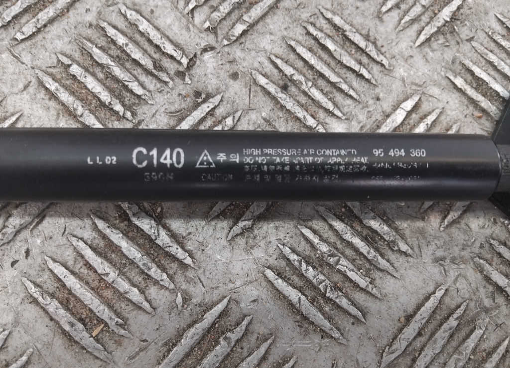 Амортизатор крышки багажника