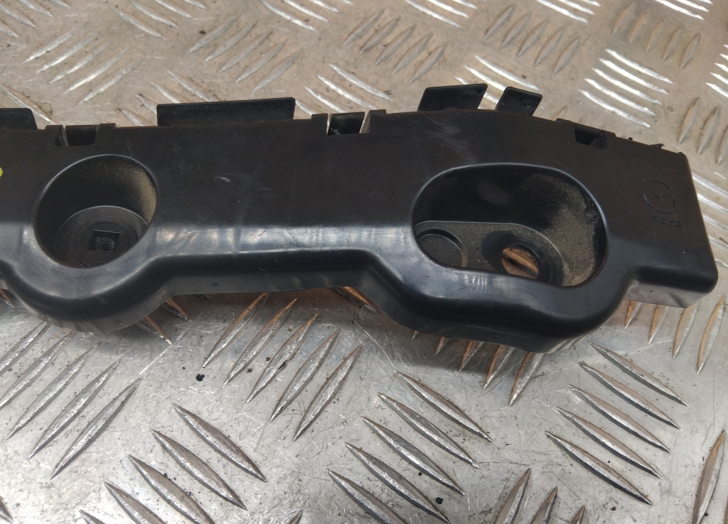 Кронштейн заднего бампера правый