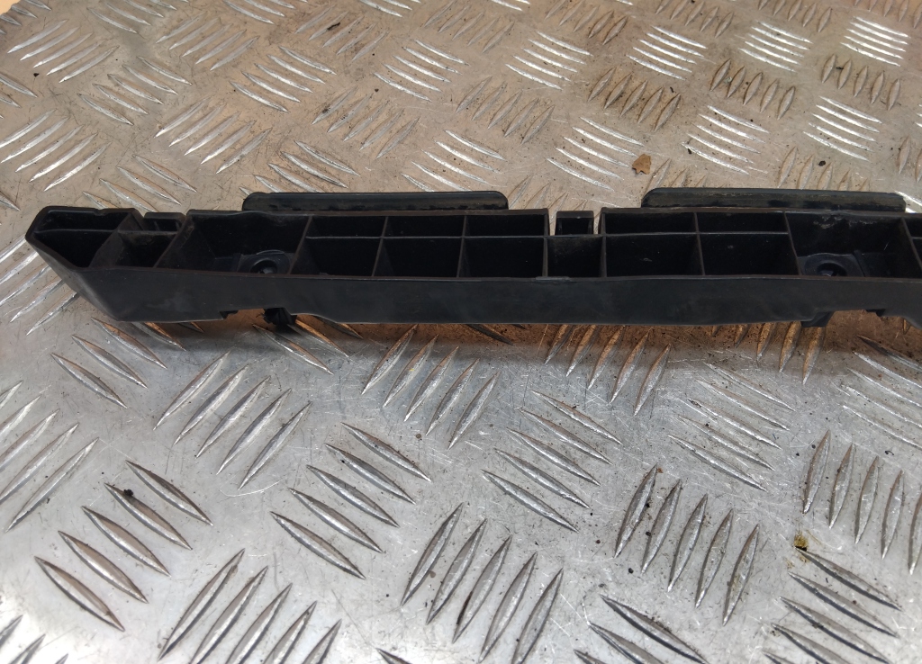 Кронштейн заднего бампера левый