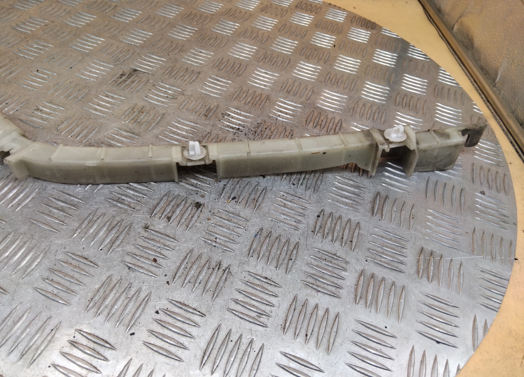 Кронштейн заднего бампера левый