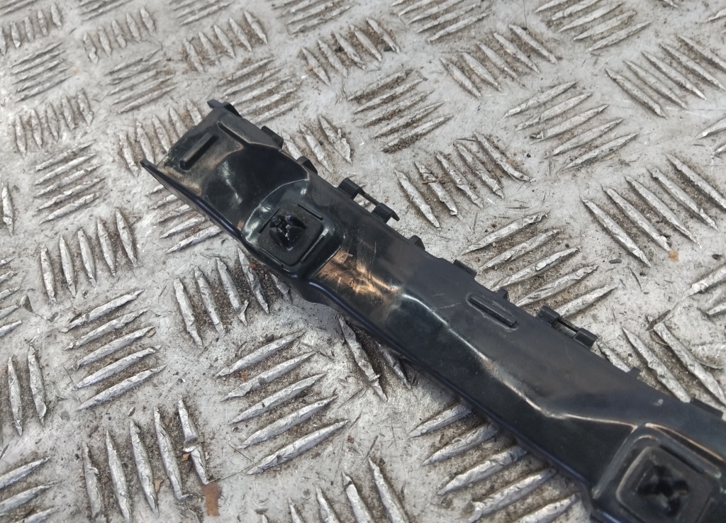 Кронштейн заднего бампера левый